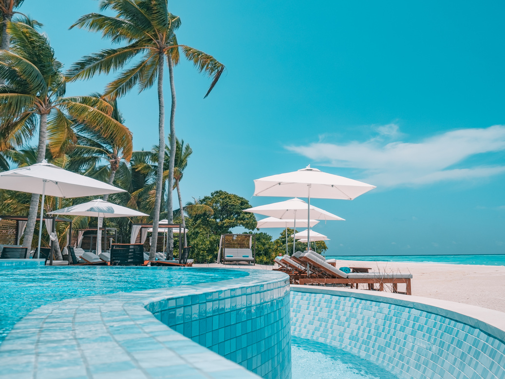 Resort poolside on ocean coast